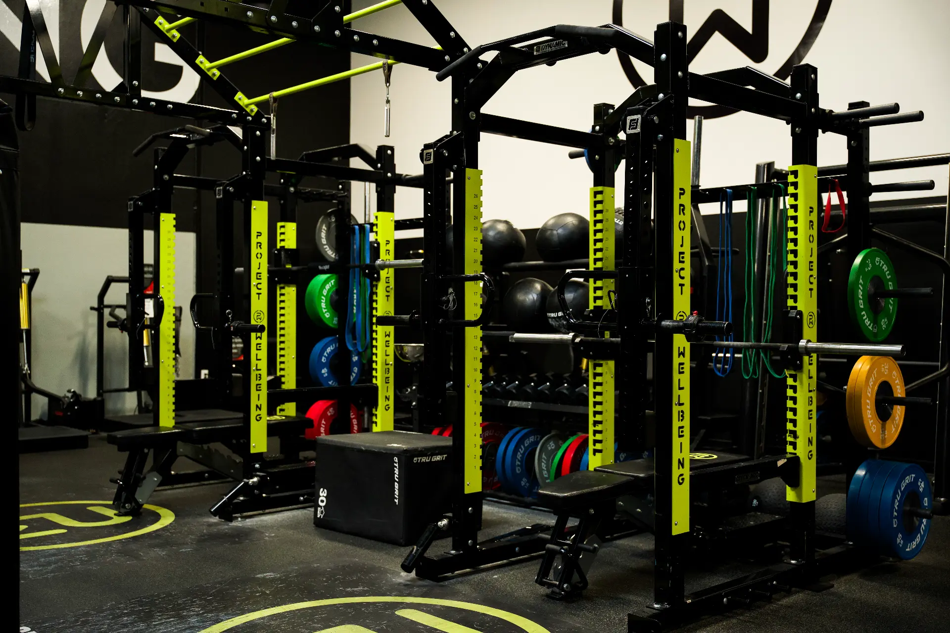 Project Wellbeing training floor — Project Wellbeing branded power racks