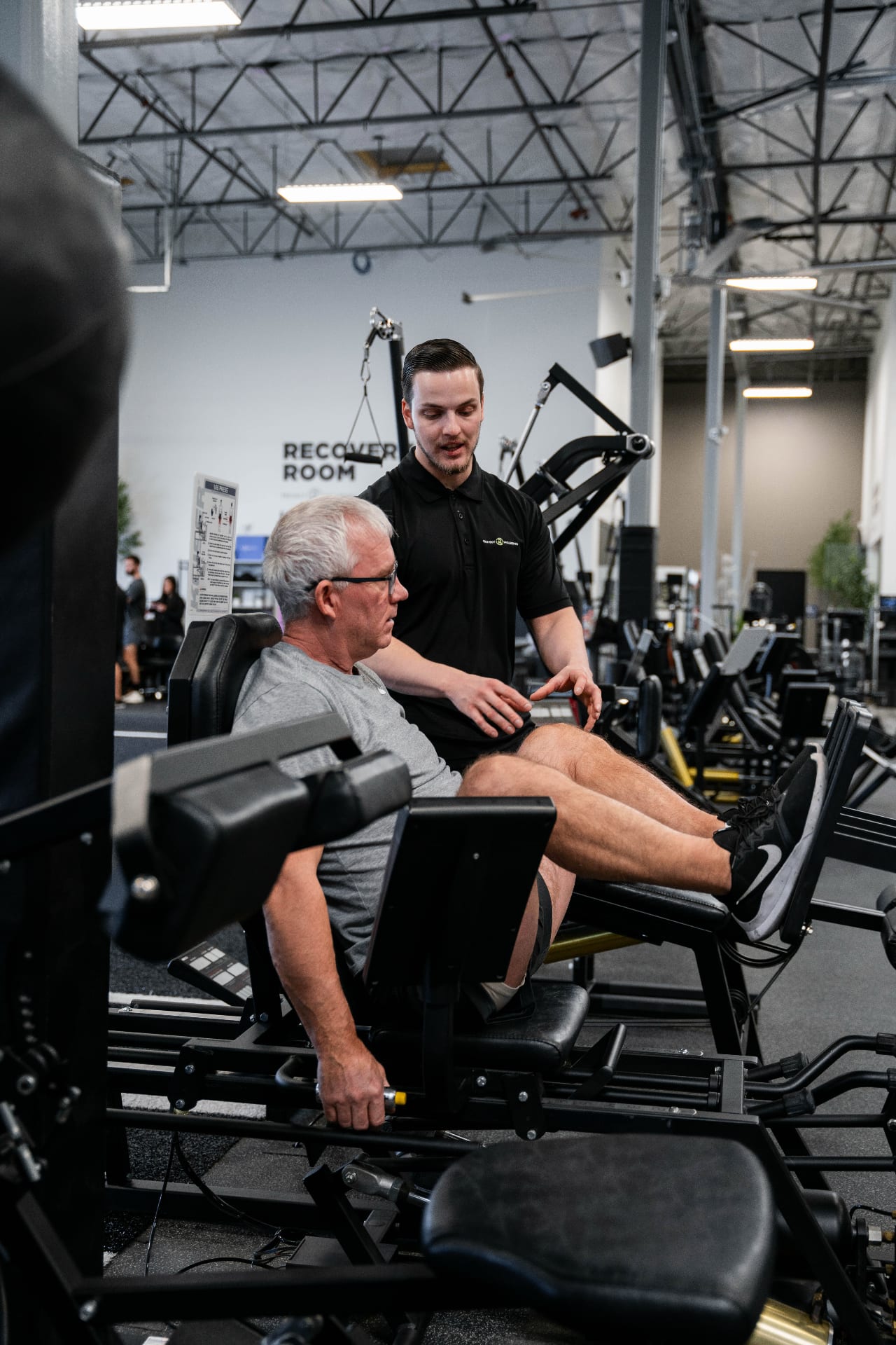 Trainer coaching a client one-on-one